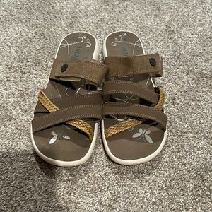 Woman’s gently worn sandal.